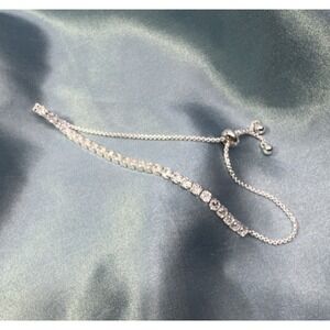 Adjustable sterling plated tennis bracelet with cubic zirconia stones